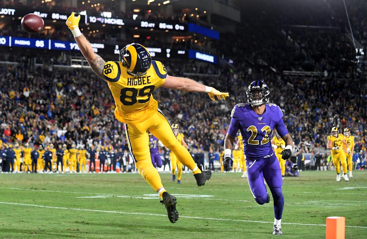 Rams tight end Tyler Higbee is unable to make a catch in the end zone during a game against the Ravens at the Coliseum.