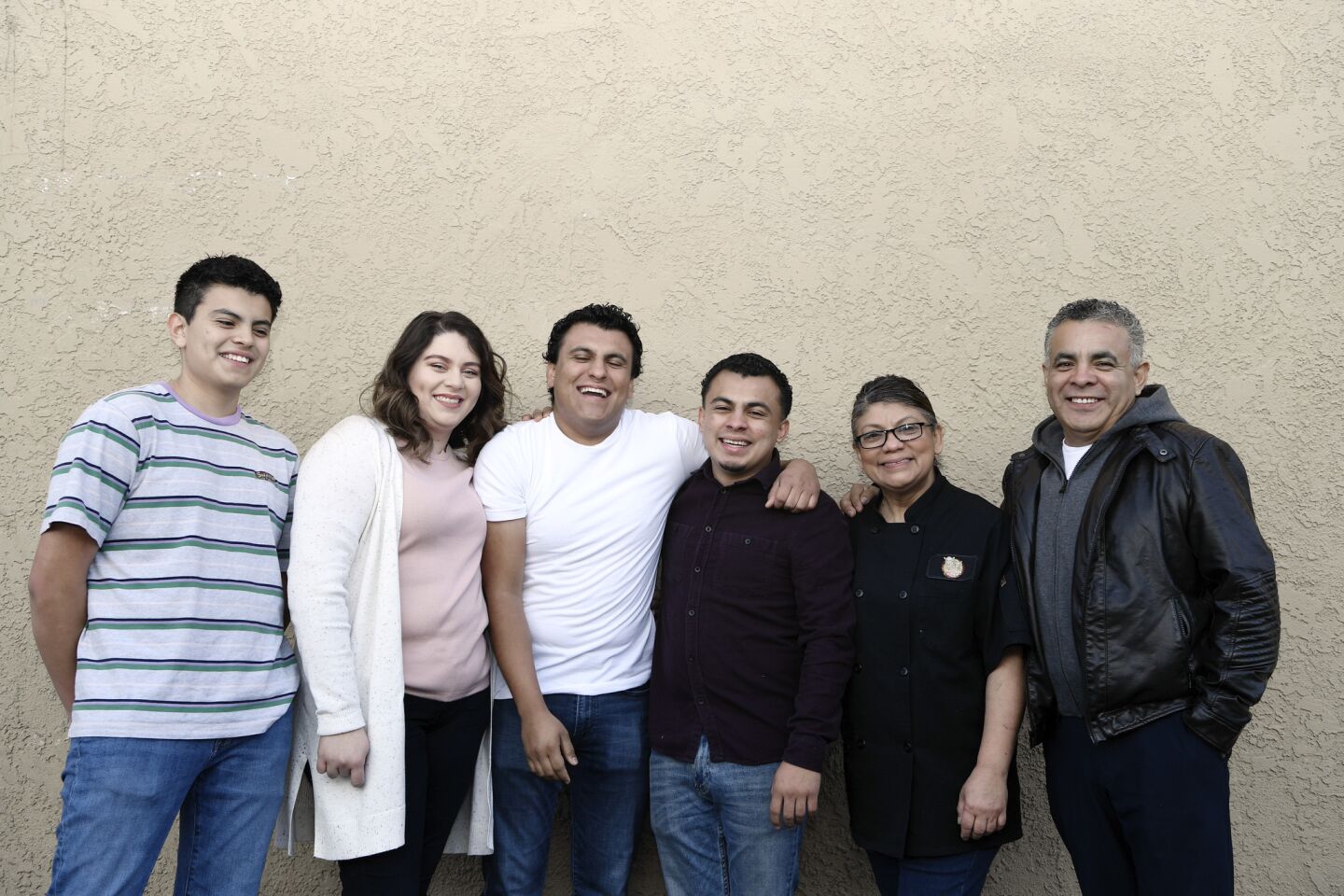 Pablo Villegas, left, Guadalupe Navarro, Erick Villegas, Anny Villegas, Maria Villegas and Jose Villegas at their Fonda Mixcoac restaurant in Anaheim.