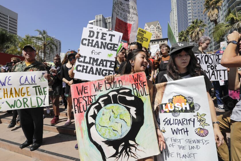 LOS ANGELES, CA - SEPTEMBER 20, 2019 — Student activists rally in a climate change protest in Pershing Square, Los Angeles on Friday afternoon September 20, 2019 as part of the global climate walkout movement. The global climate strike protests have been inspired by Greta Thunberg, a 16-year-old Swedish activist who sailed across the Atlantic Ocean in a zero-emission yacht rather than fly and on Wednesday met with members of Congress, urging them to heed scientists’ warnings on climate change. (Irfan Khan/Los Angeles Times)