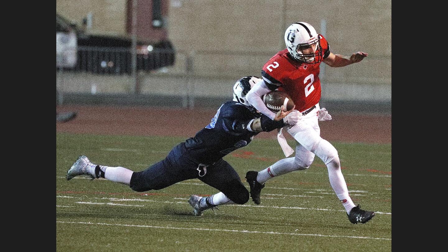 Photo Gallery: Crescenta Valley vs. Glendale in Pacific League football and the Crescenta Valley marching band takes the field in Halloween costumes