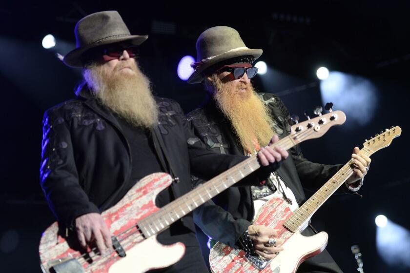 In this Thursday July 9, 2015 picture musicians Dusty Hill, left, and Billy Gibbons, right, of US rock band ZZ Top performs on stage at the Live at Sunset Festival in Zurich, Switzerland, Thursday, July 9, 2015. (Walter Bieri/Keystone via AP)