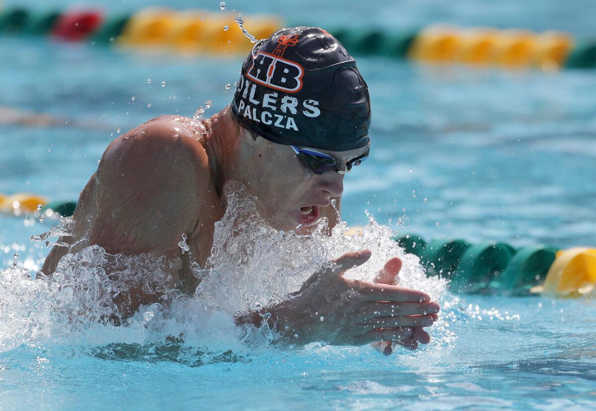 Finneas Tas Palcza of Huntington Beach swims the breaststroke of the boys' 200 individual medley during Wave League finals.