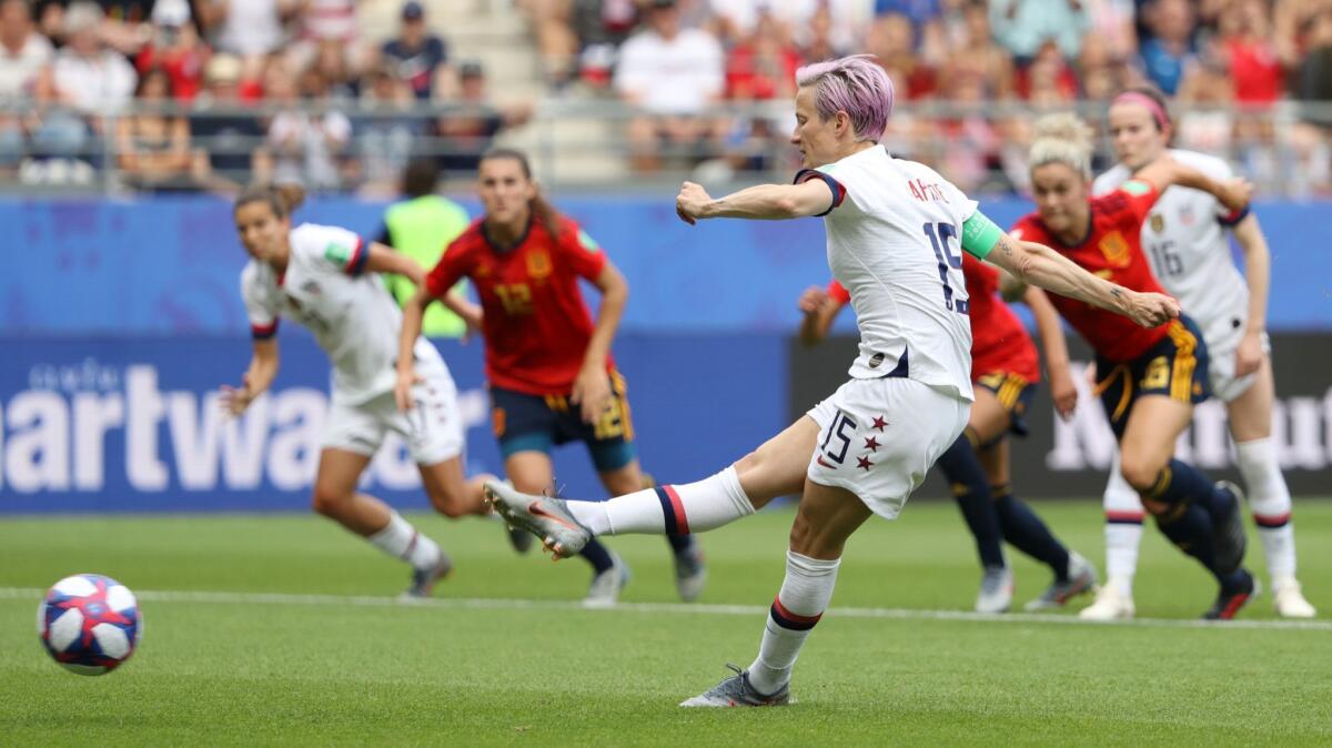 Megan Rapinoe of the U.S. scores on a penalty spot against Spain on June 24 in Reims, France.