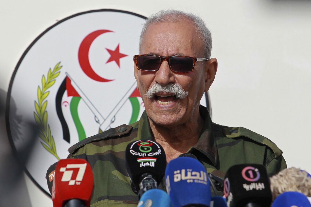 FILE - In this Feb. 27, 2021 file photo, Brahim Ghali, leader of the Polisario front, delivers a speech in a refugee camp near Tindouf, southern Algeria. Brahim Ghali, the leader of the Western Sahara independence movement at the heart of a diplomatic spat between Spain and Morocco, will appear before an investigating judge in Spain on June 1, 2021. Ghali, who has been recovering from COVID-19 in a Spanish hospital, faces a probe for possible genocide and a lawsuit for alleged tortures. (AP Photo/Fateh Guidoum, File)