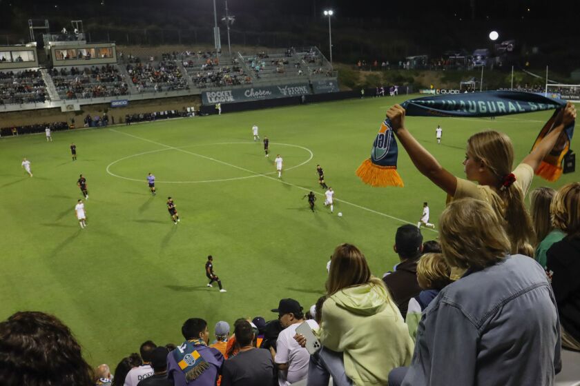 Fans in the standsshow their support for the San Diego Loyal soccer team during game against Phoenix Rising at USD's Torero Stadium on Saturday, July 24, 2021.(Photo by Sandy Huffaker for The San Diego Union-Tribune)