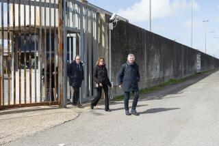 From left, Italian Senators Walter Verini, Ilaria Cucchi, and Ivan Scalfarotto exit a migrants repatriation center in Ponte Galeria, in the outskirts of Rome after a surprise visit, Wednesday, March 6, 2024. Pressure is building on Italy authorities to close the notorious migrant detention center of Ponte Galeria where Ousmane Sylla, a Guinean migrant, hung himself last month and visiting opposition senators described inhuman conditions for people ordered to leave Italy but still awaiting repatriation. (Valentina Stefanelli/LaPresse via AP)