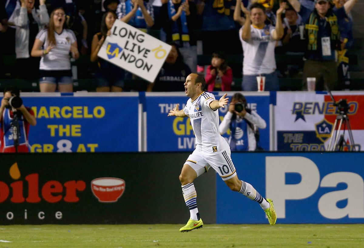 Landon Donovan celebrates his goal Saturday night against Vancouver FC at StubHub Center.