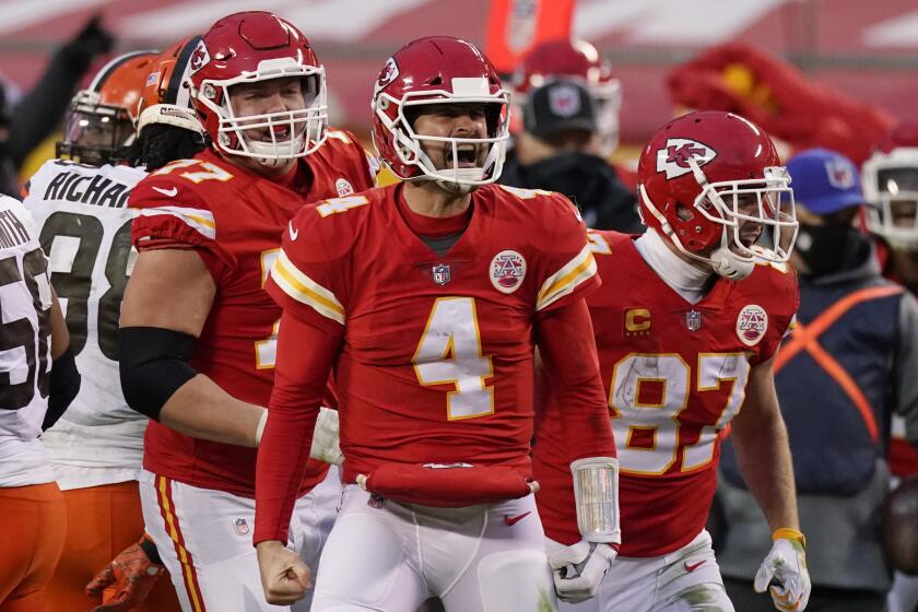 Kansas City Chiefs quarterback Chad Henne celebrates after a run during the second half.
