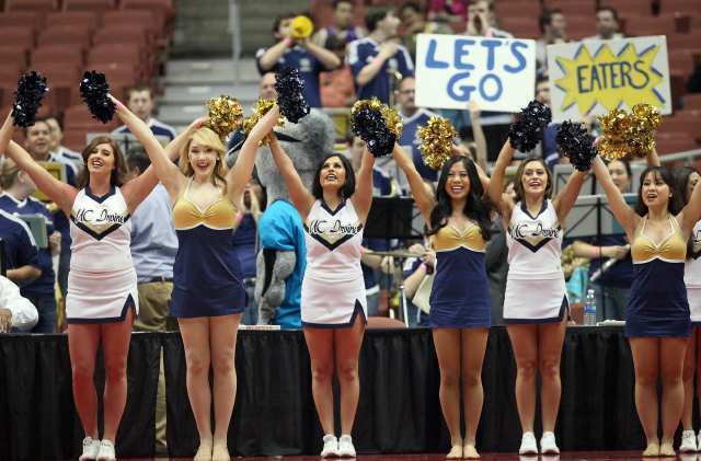 UC Irvine cheerleaders during the first half against Long Beach State in a Big West Basketball Tournament semifinal game at Honda Center.