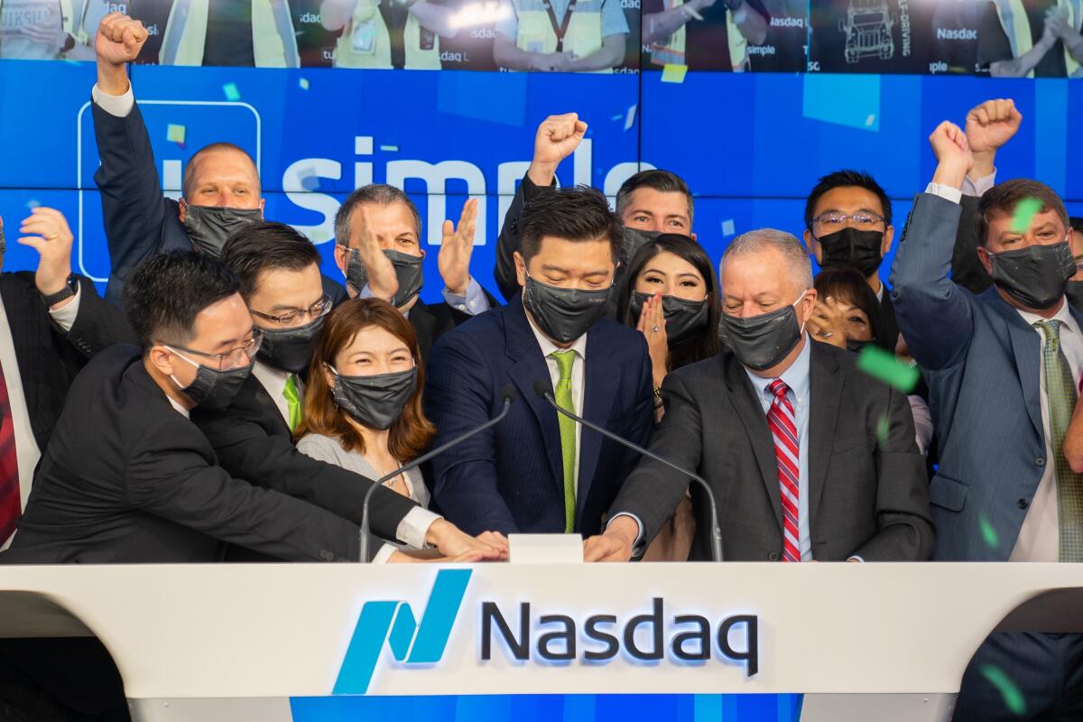 TuSimple's executive team rings the bell Thursday when it listed on Nasdaq.