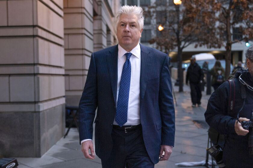 M. Evan Corcoran, an attorney for former President Donald Trump, arrives at federal court in Washington, Friday, March 24, 2023. (AP Photo/Jose Luis Magana)