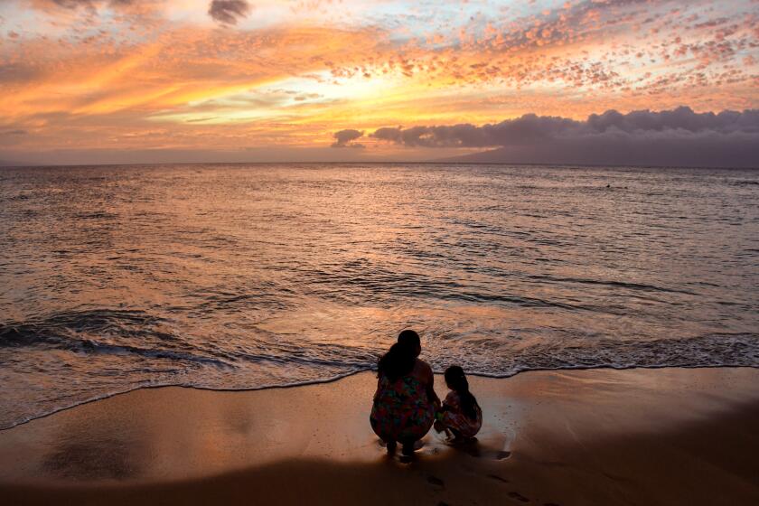 Sunset on the beach in the Kapalua resort area north of Lahaina in West Maui.