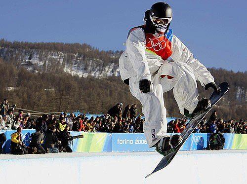 Shaun White makes his first run in the finals of the Men's Halfpipe Snowboard competition.