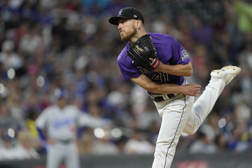 Colorado Rockies starting pitcher Chad Kuhl works against the Los Angeles Dodgers during the eighth inning of a baseball game Monday, June 27, 2022, in Denver. (AP Photo/David Zalubowski)