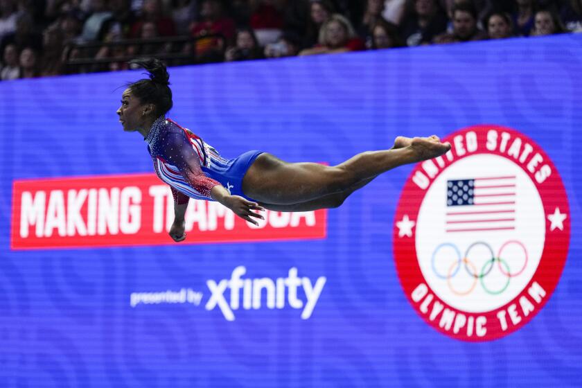 Simone Biles competes in the floor exercise at the United States Gymnastics Olympic.