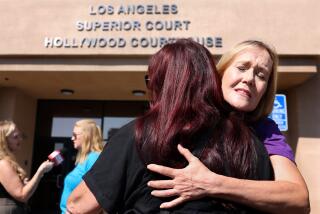 HOLLYWOOD-CA-OCTOBER 1, 2024: Residents from the Antelope Valley Diane Swick, center, and Mary Jeters, right, embrace outside of the Hollywood Courthouse after attending a hearing to determine a placement recommendation for Christopher Hubbart, a violent sexual predator who was dubbed the "Pillowcase Rapist" for a series of rapes and other sex crimes, on October 1, 2024. The proposal to house Hubbard in the Antelope Valley town of Juniper Hills has brought calls from Los Angeles County Supervisor Kathryn Barger and Dist. Atty. George Gascon for residents to voice their concerns. (Christina House / Los Angeles Times)