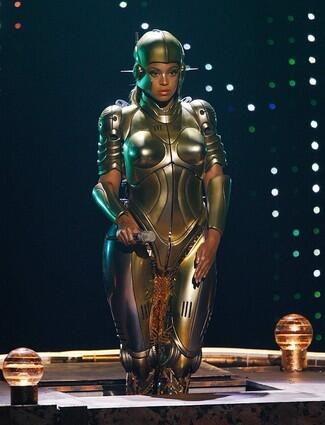 Beyonce performs at the 7th annual BET Awards, rising from the stage dressed in what looks like armor.