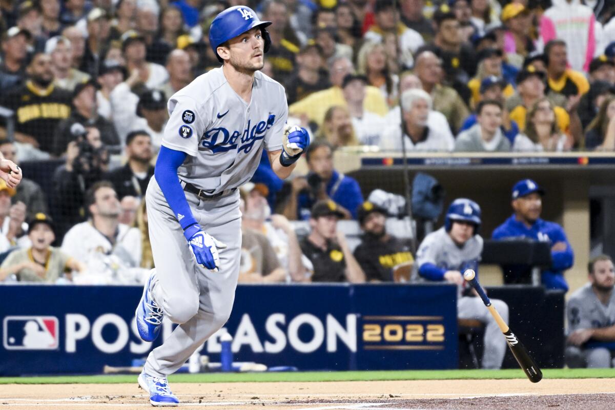 Dodgers shortstop Trea Turner tosses his bat on a fly out during the first inning Saturday.