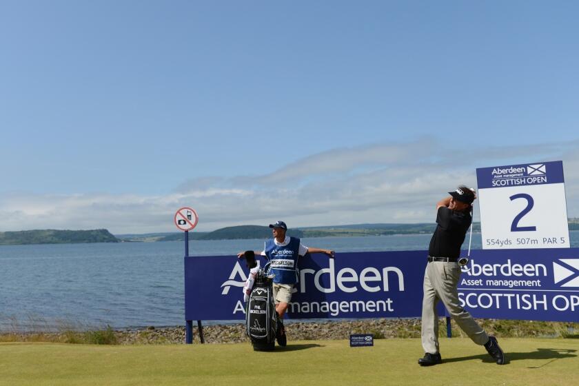 Phil Mickelson tees off during a pro-am round Wednesday ahead of the Scottish Open at Castle Stuart in Inverness, Scotland.