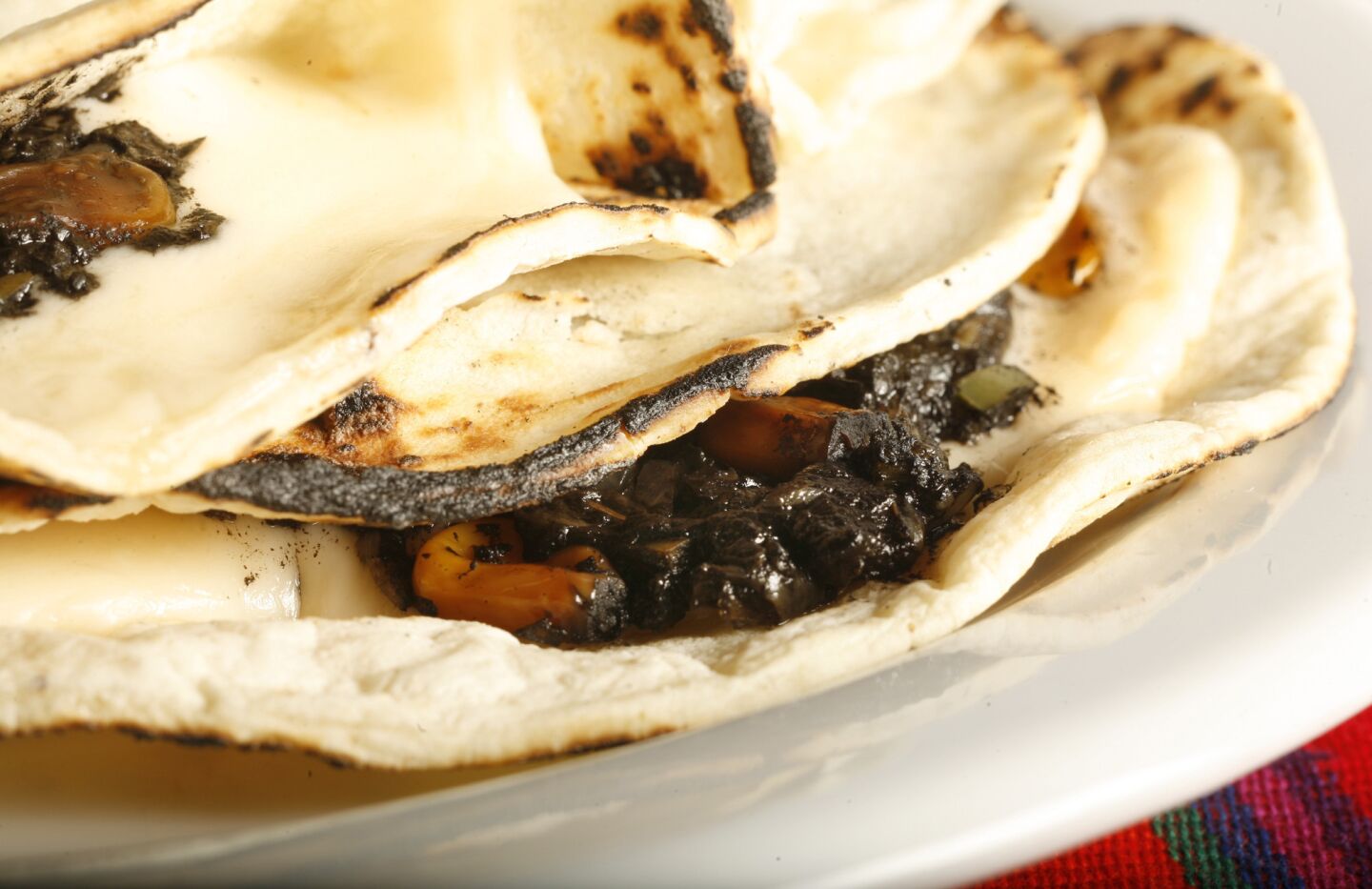 Huitlacoche lends a definite earthy richness to the quesadillas, and a robustness similar to truffles to the finished dish. Recipe: Huitlacoche quesadillas