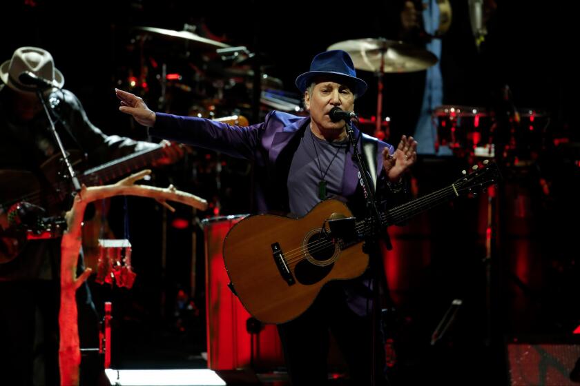 Paul Simon performs at the Hollywood Bowl on Wednesday.