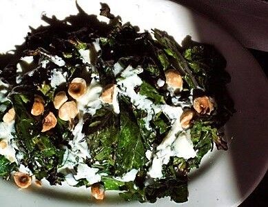 Quickly charred Russian kale is topped with a bright yogurt dressing flavored with garlic, shallot, fresh mint and a touch of red wine vinegar. Recipe: Grilled Russian kale with yogurt dressing and toasted hazelnuts