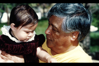 Eduardo Chavez then 2 years old with his grandfather Cesar.