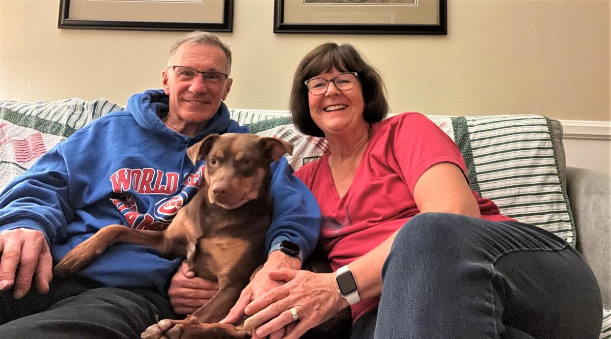 San Diego residents John and Mary O'Connor with newly adopted dog Wiggles.