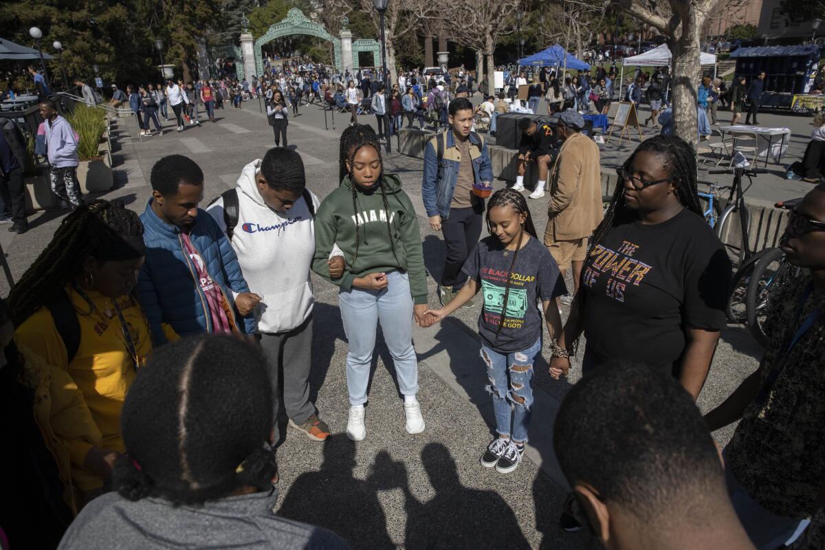 UC Berkeley Black students gather in circle on campus