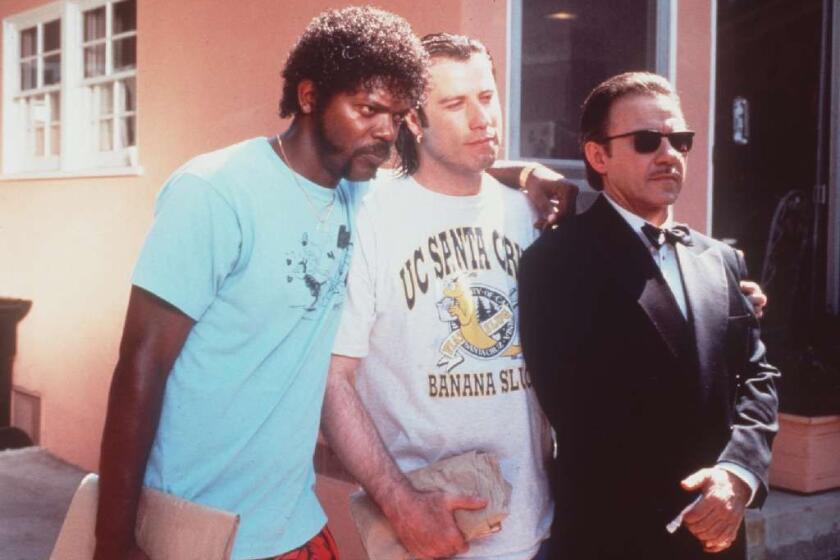 L–R: Samuel Jackson, John Travolta and Harvey Keitel in a scene from the movie Pulp Fiction. Miramax Films. Photo by Linda R. Chen