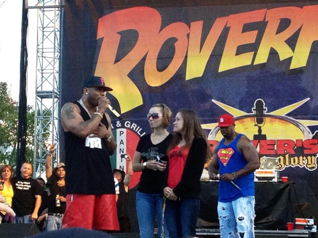 Nelly invites Cleveland kidnapping victim on stage