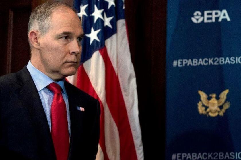 FILE - In this Tuesday, April 3, 2018, file photo, Environmental Protection Agency Administrator Scott Pruitt attends a news conference at the EPA in Washington, on his decision to scrap Obama administration fuel standards. The fossil-fuels lobbyist tied to the bargain-priced Capitol Hill condo leased by Pruitt is taking early retirement as a result of the scandal. (AP Photo/Andrew Harnik, File)