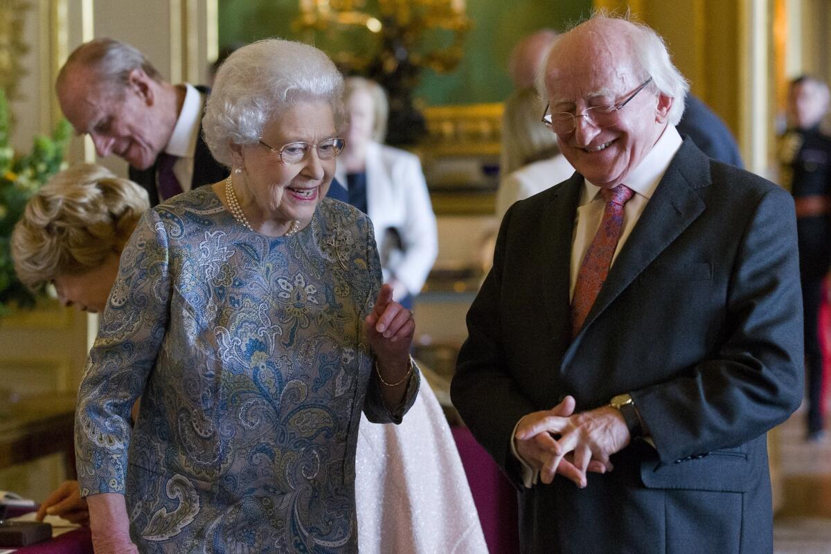 Queen Elizabeth II entertains Irish President Michael Higgins at Windsor Castle on Tuesday.