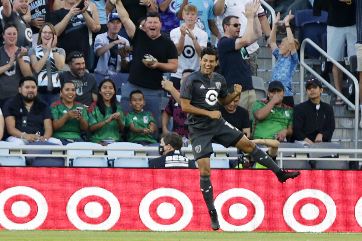 MLS All-Star Carlos Vela celebrates his goal during the first half of the MLS All-Star soccer match against Liga MX All-Stars on Wednesday, Aug. 10, 2022, in St. Paul, Minn. (AP Photo/Andy Clayton-King)