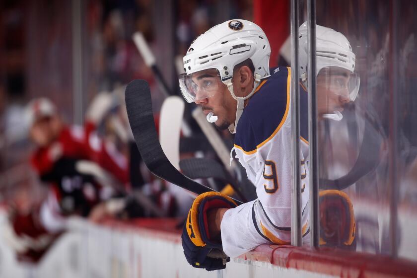 Sabres forward Evander Kane watches from the bench during the second period of a game against the Coyotes on Jan. 18.