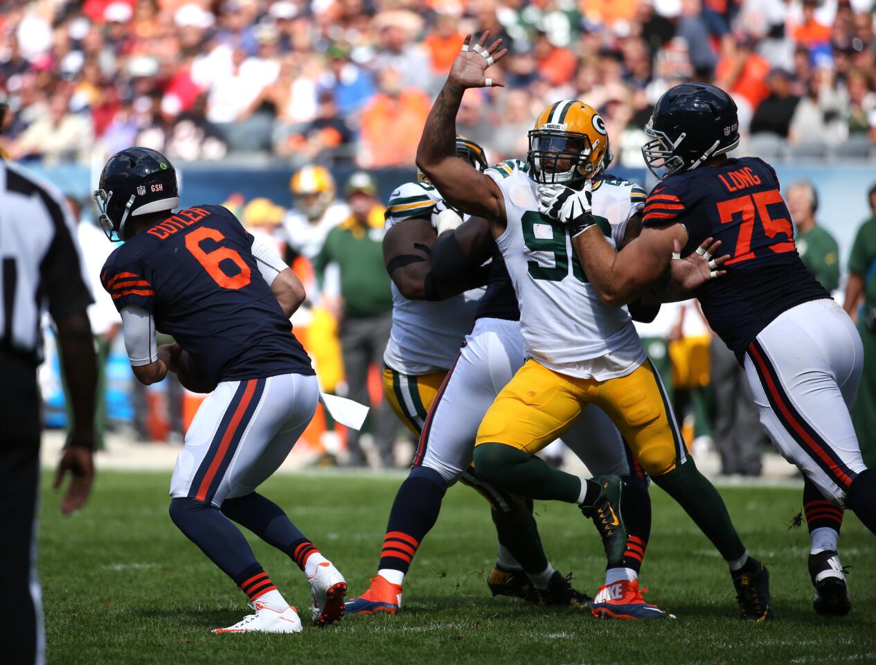 Chicago Bears guard Kyle Long (75) blocks Green Bay Packers linebacker Mike Neal (96) in the second half of a game at Soldier Field in Chicago on Sept. 13, 2015.