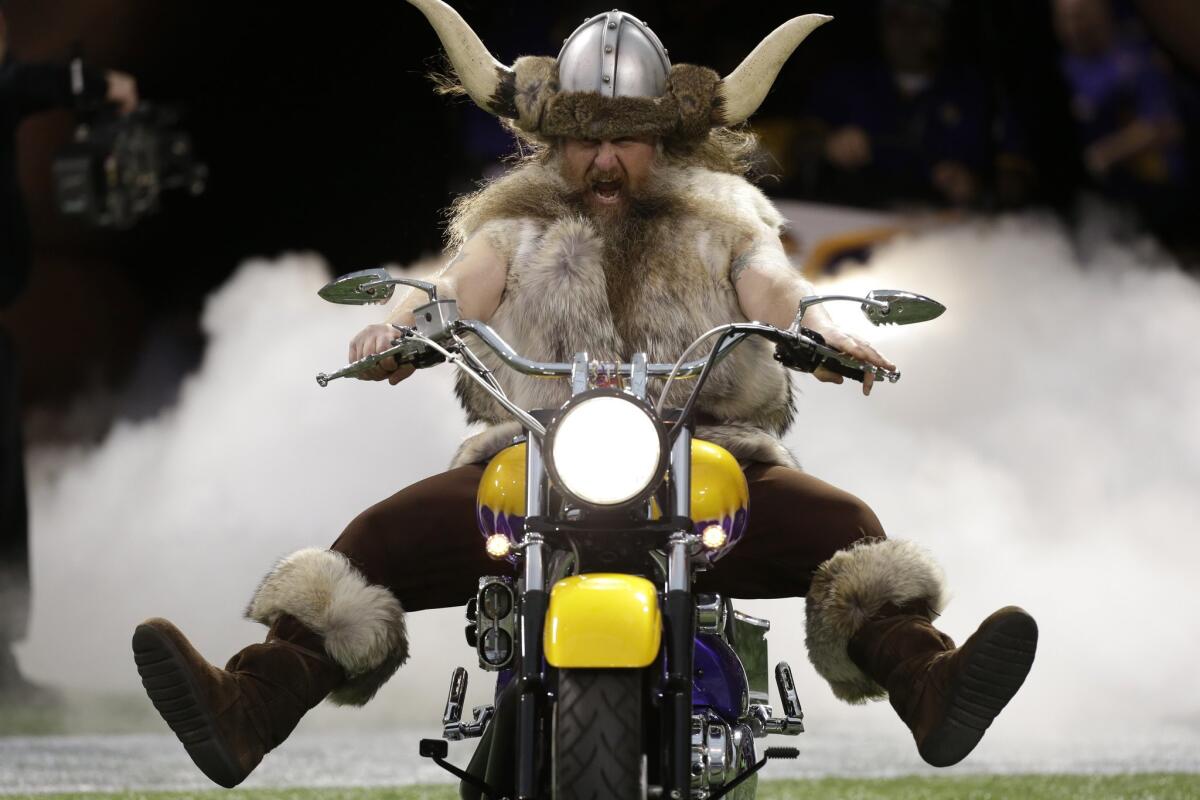 Ragnar the Viking rides onto the field before a Minnesota Vikings game in 2012.