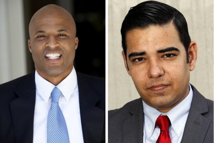Damon Dunn, left, and Robert Garcia are headed to a runoff after Tuesday's Long Beach mayoral election.