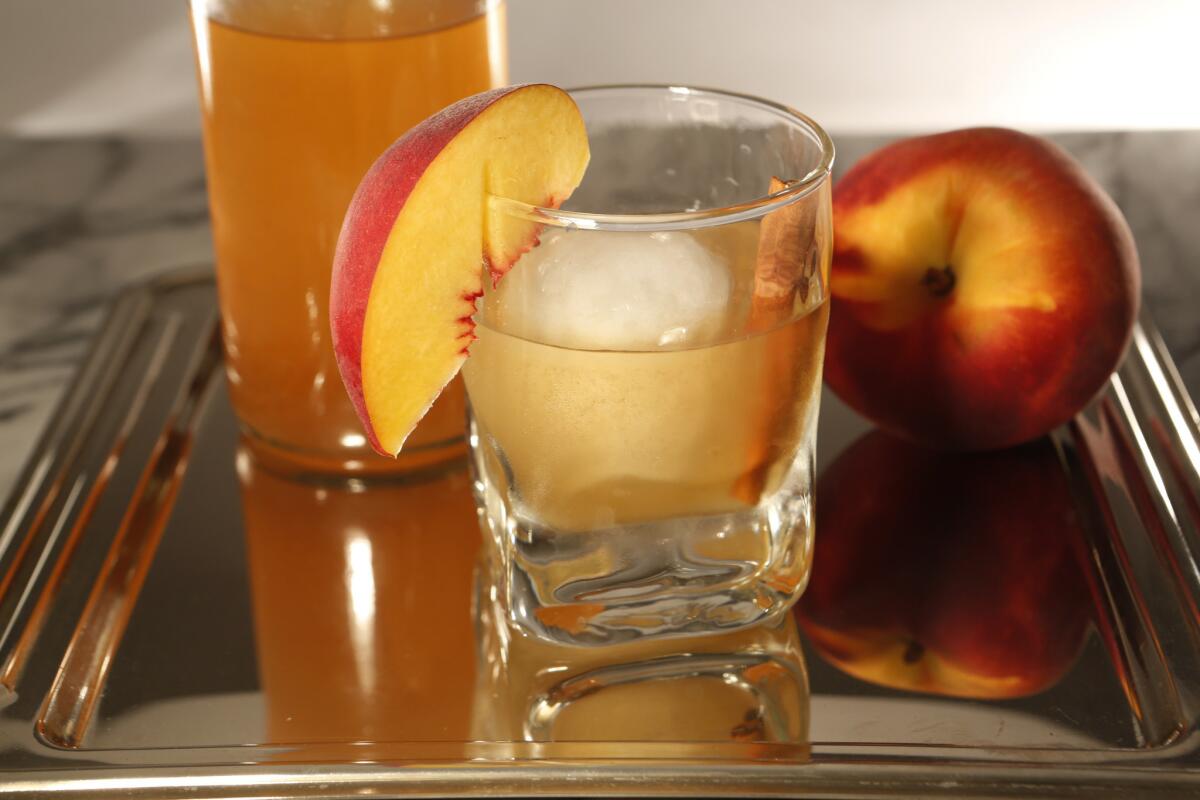 Peaches and bourbon always work together, especially in this cocktail.