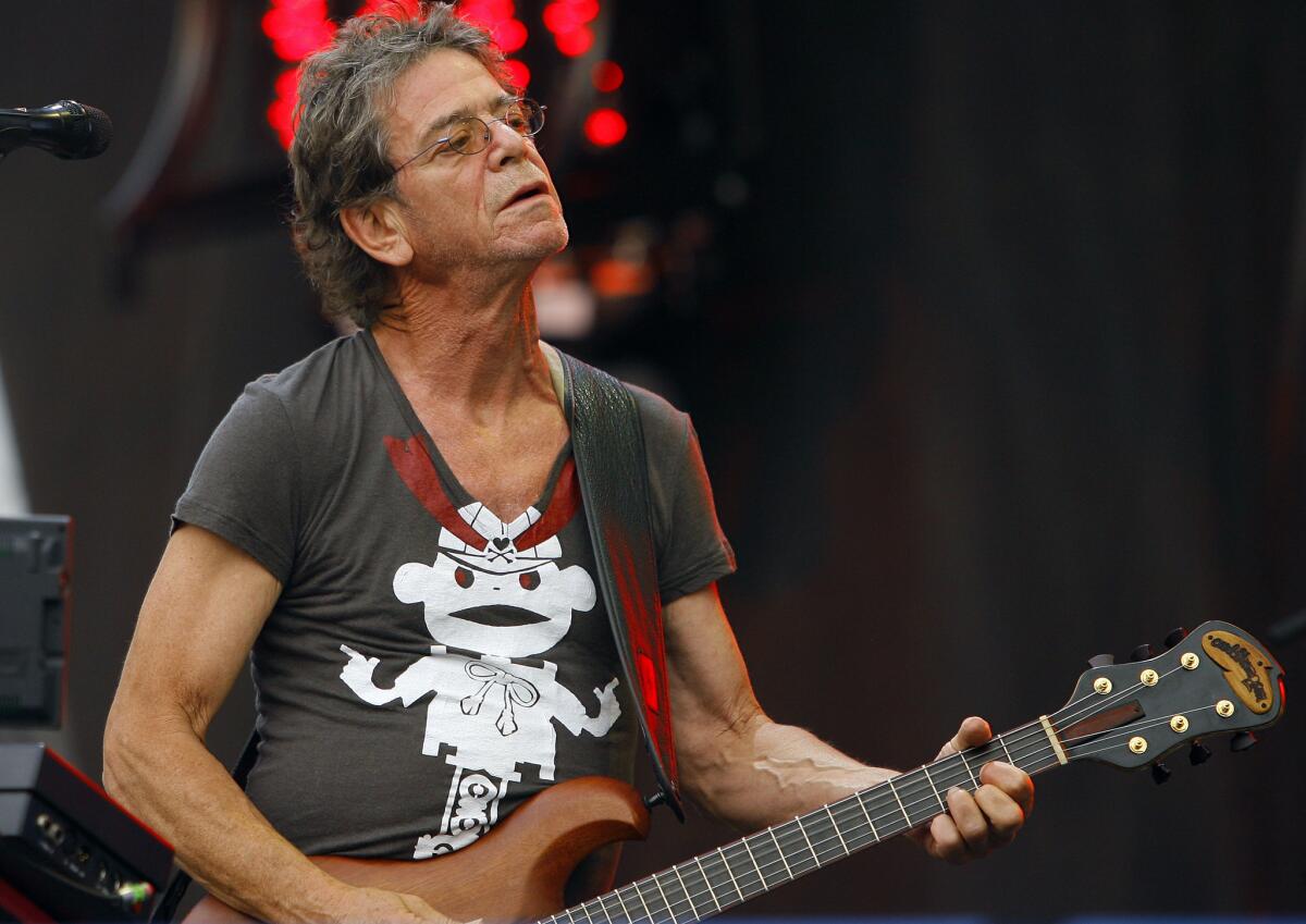 Lou Reed, seen performing at Lollapalooza in 2009, died Sunday. The influential New York rocker inspired countless musicians, including U2, Matthew Sweet and Cowboy Junkies.
