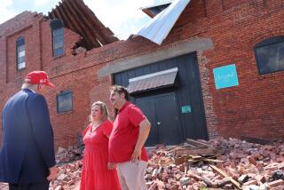 ATLANTA, GEORGIA - SEPTEMBER 30: Republican presidential nominee, former U.S. President Donald Trump, speaks with Katie Watson and Patrick Watson, owners of Chez What Furniture store that was damaged during Hurricane Helene on September 30, 2024 in Valdosta, Georgia. Trump met with local officials, first responders, and residents who have been impacted by last week's hurricane which has left at least 90 people dead across Florida, Georgia, North Carolina, South Carolina, and Virginia. Millions are still without power, water, or reliable communications. U.S. President Joe Biden and Democratic presidential nominee, U.S. Vice President Kamala Harris have spoken with local leaders and stated that they plan to visit affected areas when the time is right. (Photo by Michael M. Santiago/Getty Images)