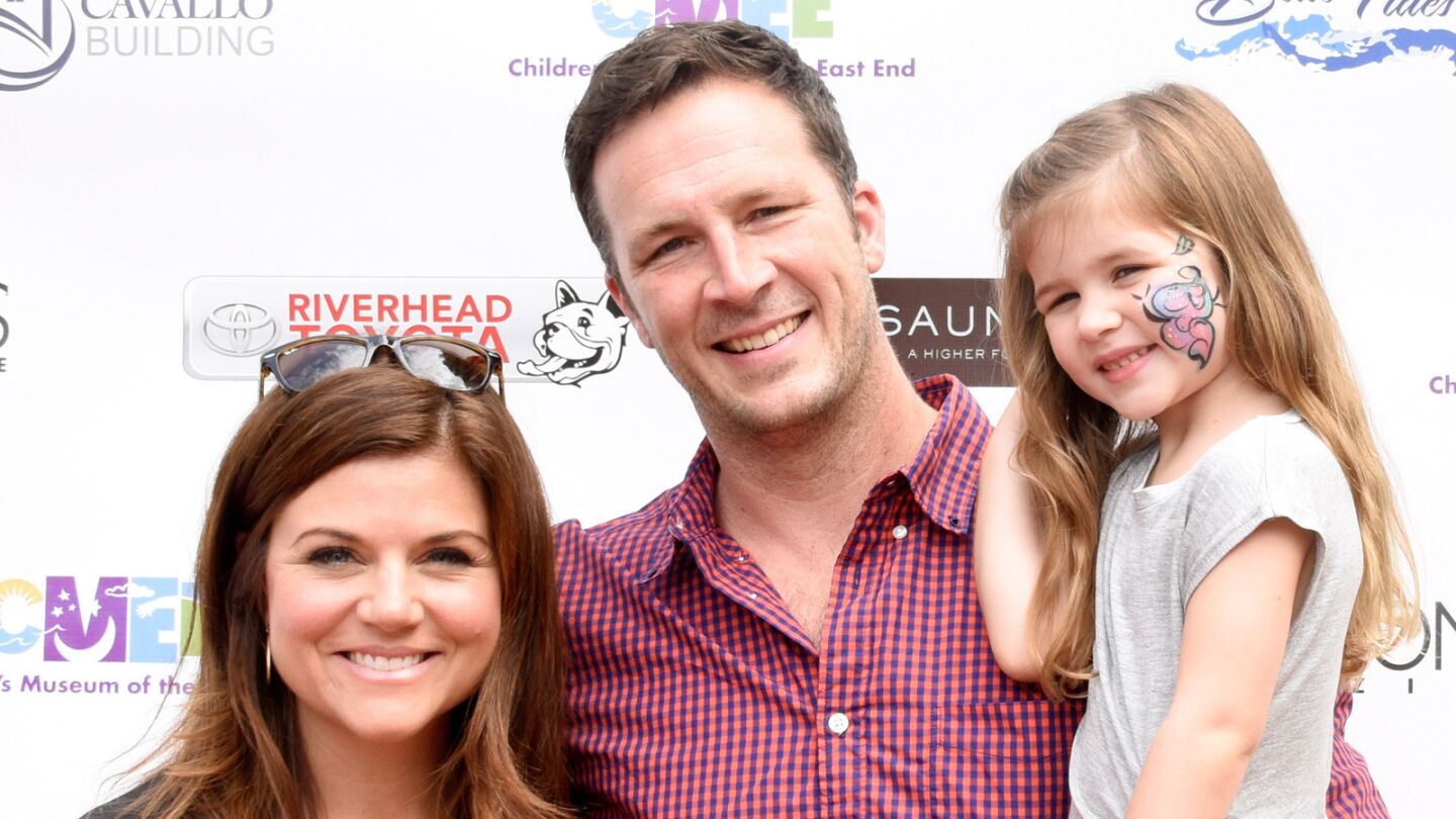 It looks like Tiffani Thiessen and her husband, Brady Smith, have expanded their family. Thiessen gave birth to the couple's second child, son Holt Fisher Smith. Harper Renn, pictured, is one happy older sister.