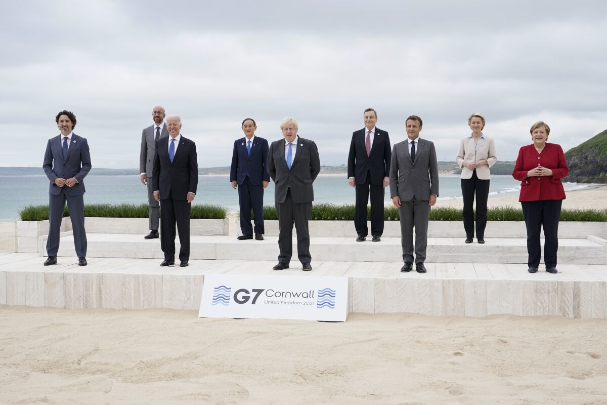 Leaders of the Group of 7 pose for a photo at the beach in Cornwall, England, on June 11, 2021.