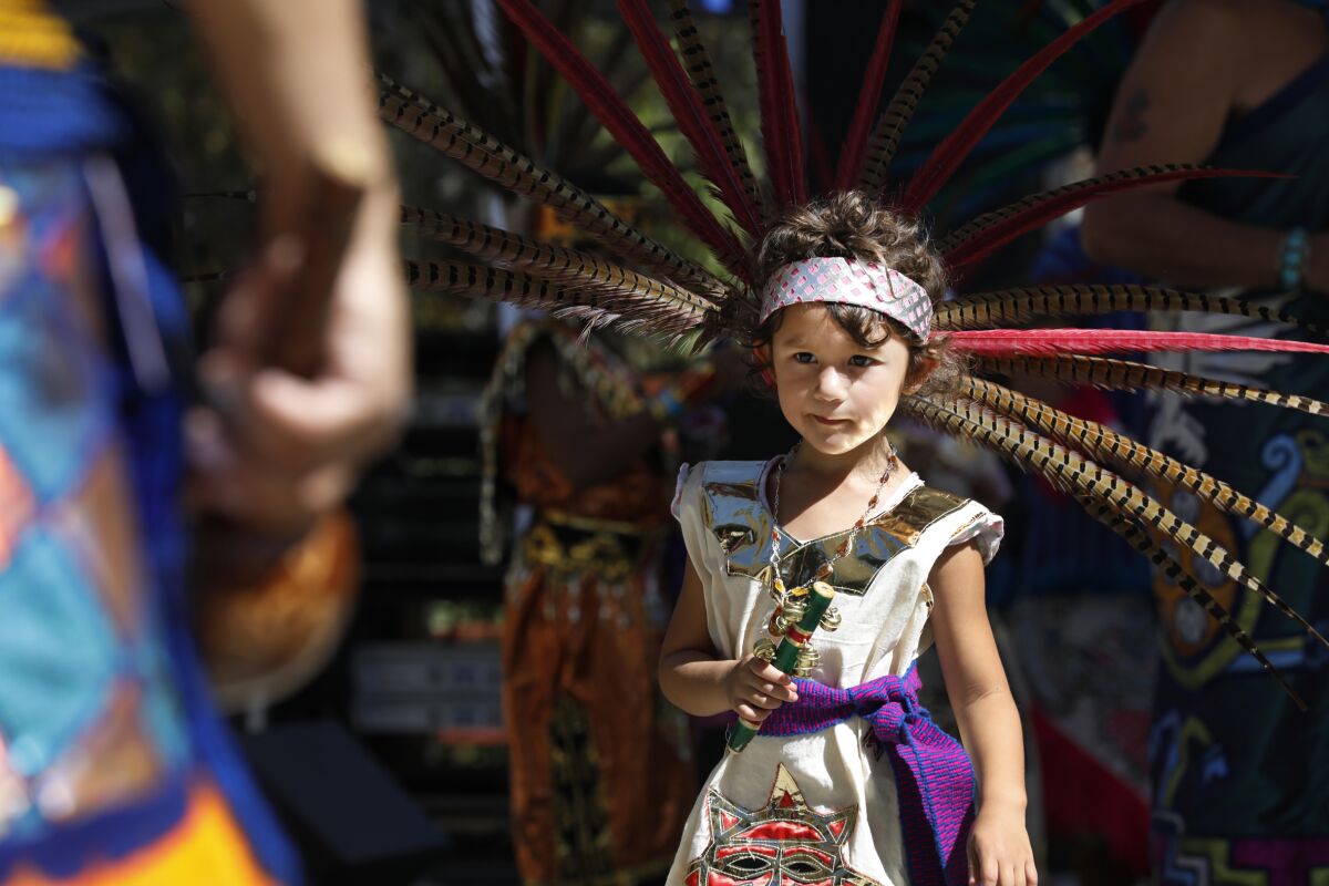 Zyania Gonzalez, 4, performs with Danza Mexi'cayotl at the Hispanic Heritage Festival.