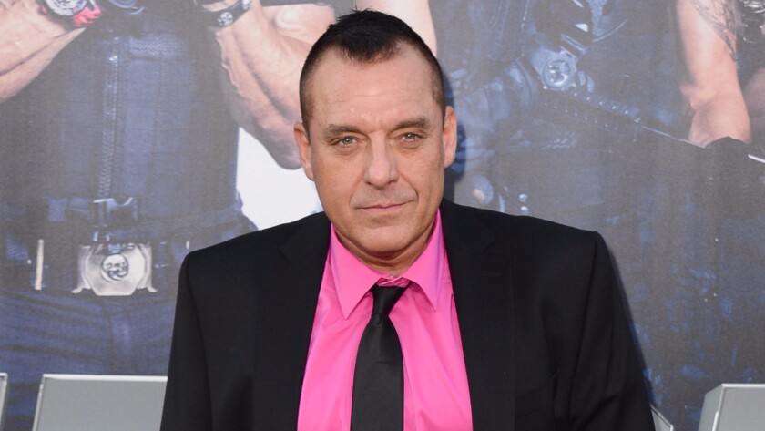 Actor Tom Sizemore, shown at the 2014 premiere of "The Expendables 3" in Los Angeles, was charged this week with three misdemeanors connected to his domestic violence arrest in July.