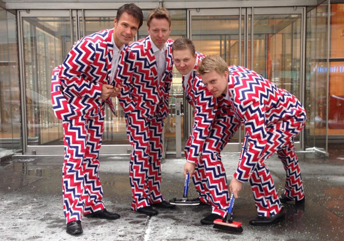 Norwegian curlers Thomas Ulsrud, left, Torgor Nergard, Christoffer Svae and Havard Vad Petersson pose in their new Sochi 2014 Olympic uniforms Tuesday in New York.