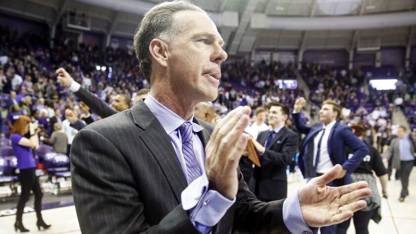 Texas Christian coach Jamie Dixon applauds a February win over Kansas State in Fort Worth.