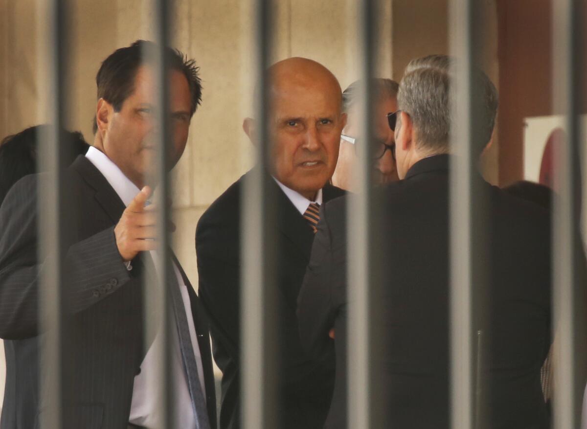 Former LA County Sheriff Lee Baca waits on the loading dock of the L.A. Federal Courthouse on July 18, 2016 after a judge threw out his plea deal for lying to authorities and obstructing justice.