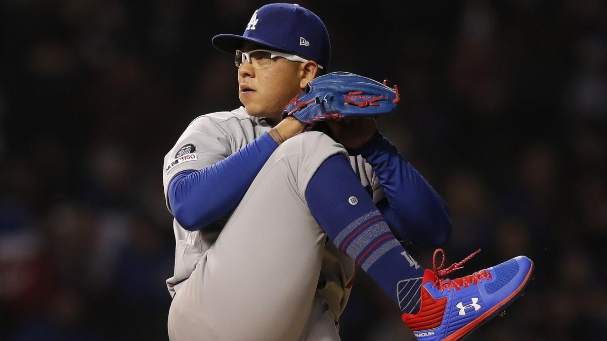 Dodger Julio Urias pitches against the Cubs on April 23 in Chicago. Urias was arrested Monday evening on suspicion of misdemeanor domestic battery.