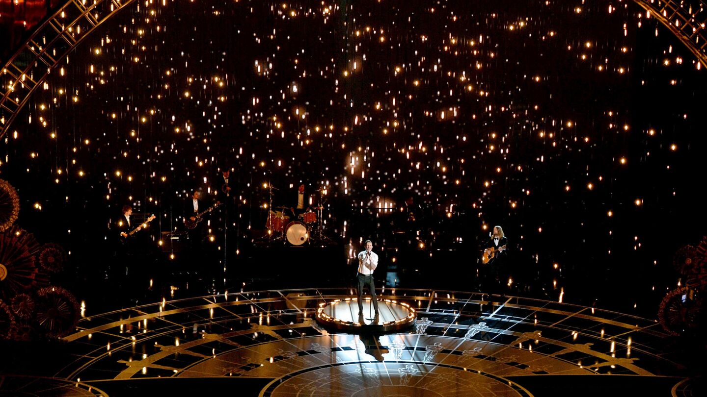 Singer Adam Levine of Maroon 5 performs "Lost Stars" from "Begin Again" during the 87th Academy Awards.